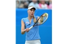 EASTBOURNE, ENGLAND - JUNE 14: Naomi Broady of Great Britain prepares to serve against Belinda Bencic of Switzerland during their Women's Singles first round qualifying match on day one of the Aegon International at Devonshire Park on June 14, 2014 in Eastbourne, England.  (Photo by Steve Bardens/Getty Images)